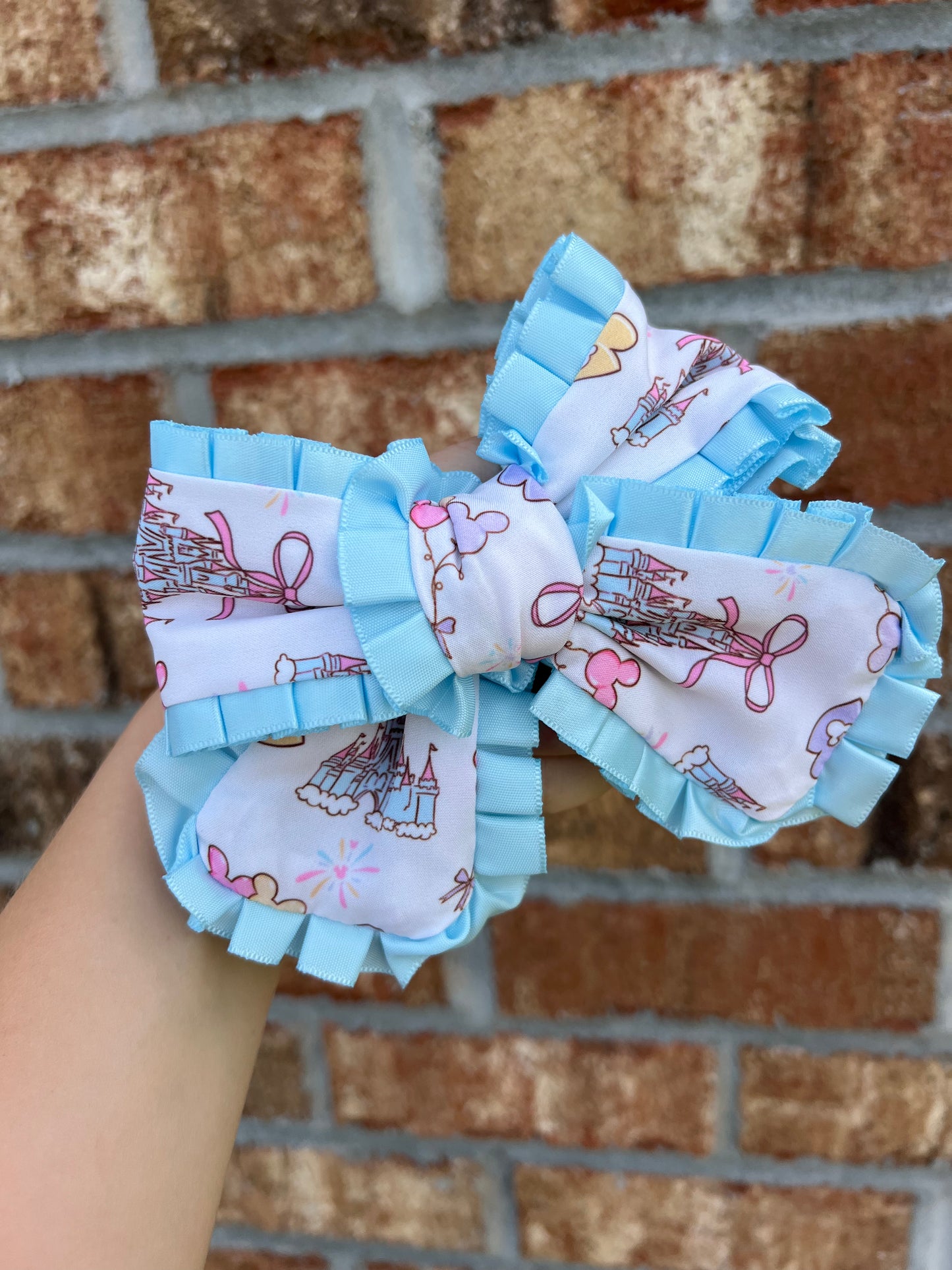 Ruffle castle bow