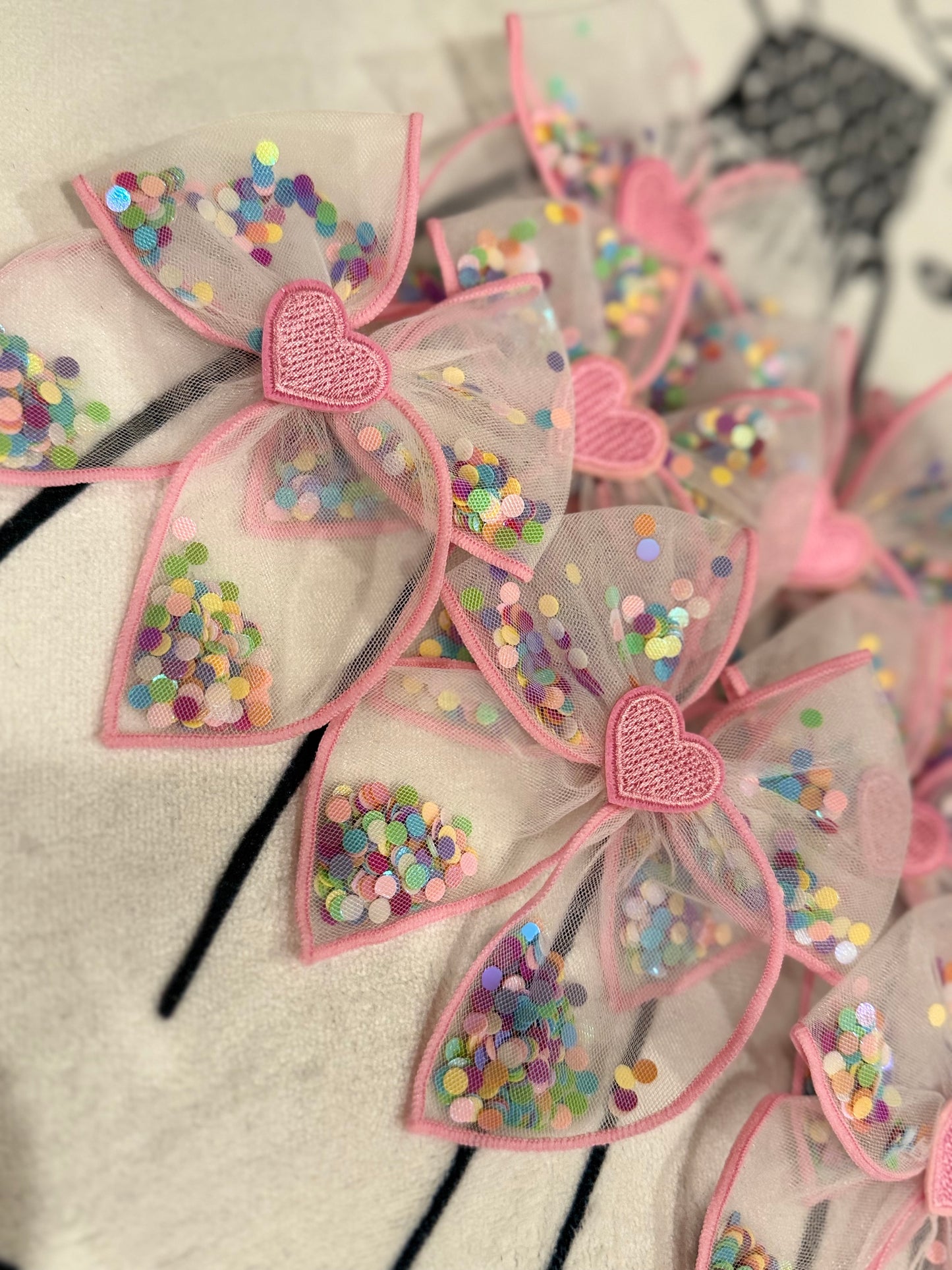 Heart patch confetti bow