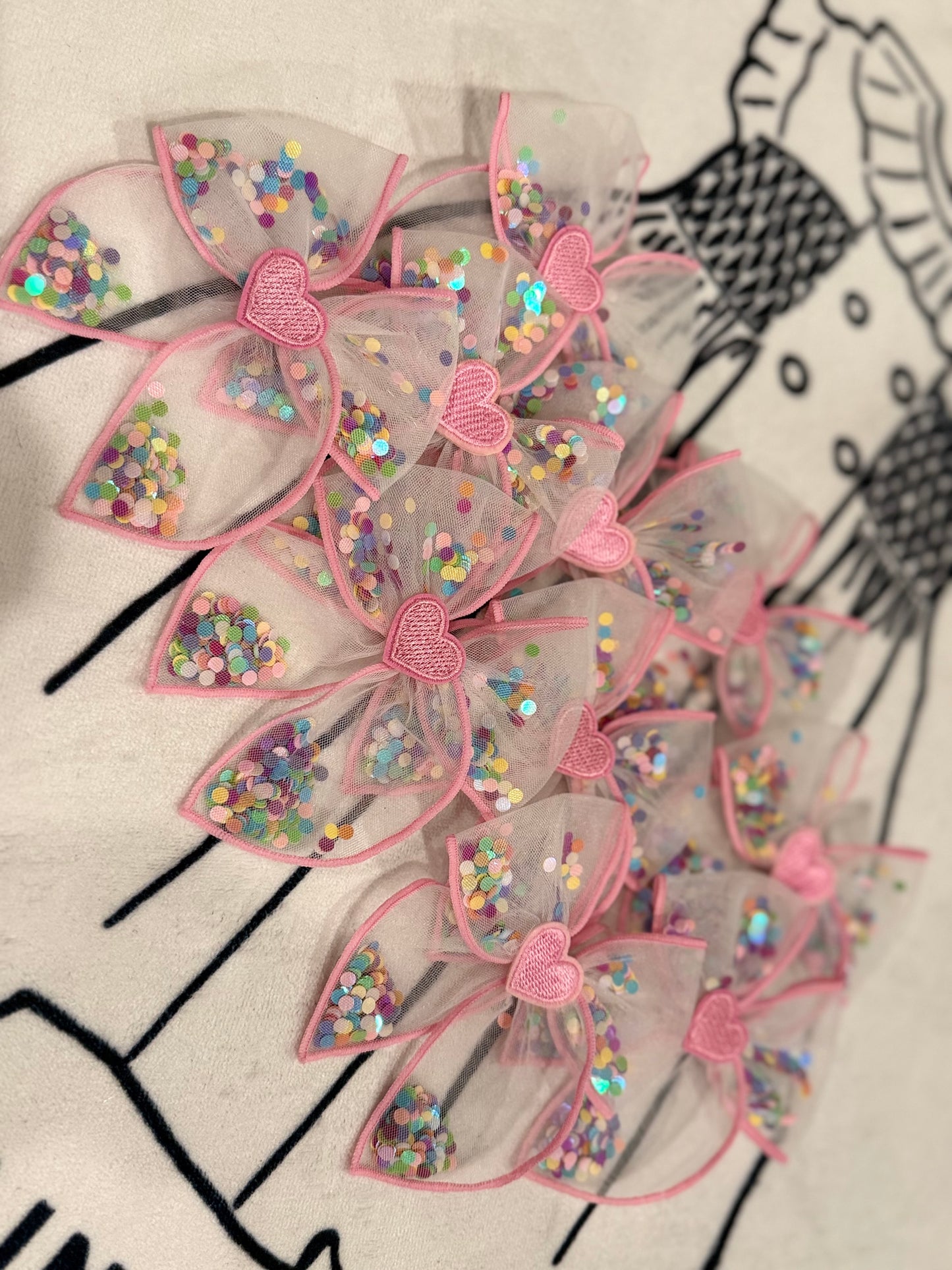 Heart patch confetti bow